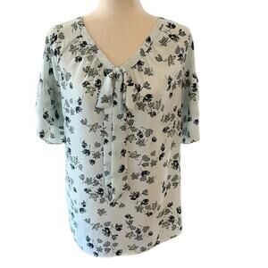 LOFT summery light blouse. Ruffle sleeves. Tie neck. Floral pattern size Medium